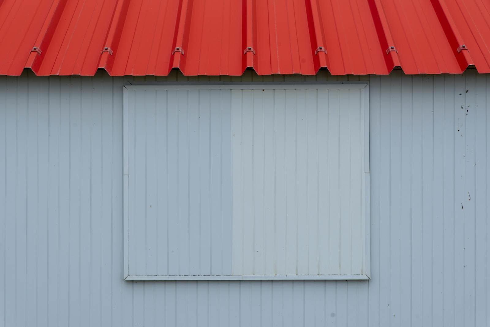 Standing-seam metal roof with dramatic architectural lines